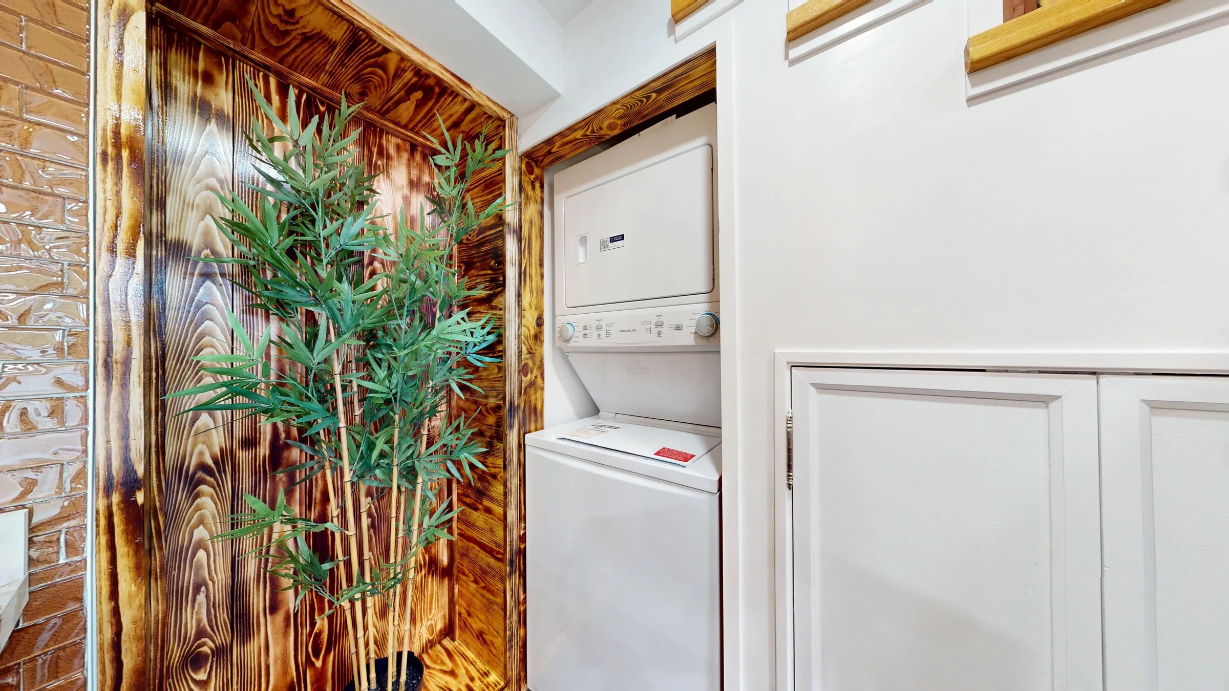 In-suite stacked washer and dryer